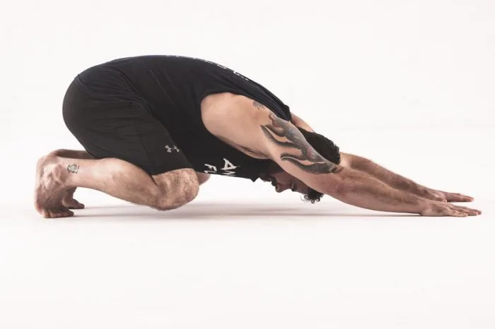 Animal Flow Master Instructor Andrew 'Chaddy' Chadwick performs a Loaded Beast